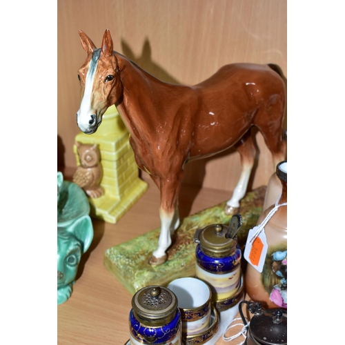 509 - A SMALL GROUP OF ROYAL DOULTON SILVER, ETC, comprising a Royal Doulton chestnut horse 'Merely a Mino... 