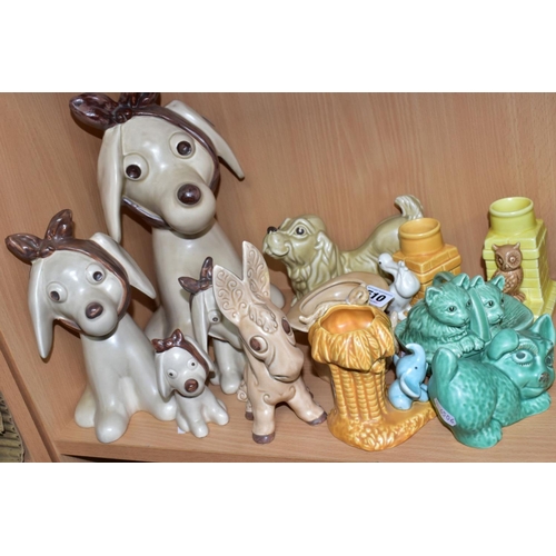 510 - SYLVAC POTTERY ANIMALS to include a graduated bandaged dog set of four, largest approximately 31cm, ... 