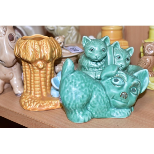 510 - SYLVAC POTTERY ANIMALS to include a graduated bandaged dog set of four, largest approximately 31cm, ... 