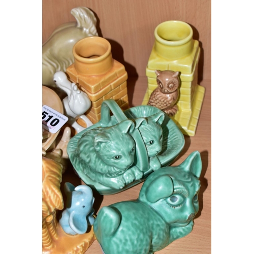 510 - SYLVAC POTTERY ANIMALS to include a graduated bandaged dog set of four, largest approximately 31cm, ... 