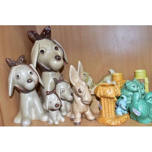 510 - SYLVAC POTTERY ANIMALS to include a graduated bandaged dog set of four, largest approximately 31cm, ... 