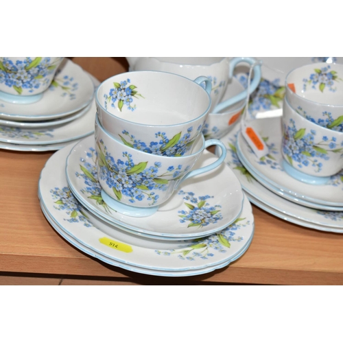 514 - TWENTY ONE PIECES OF SHELLEY FORGET-ME-NOT PATTERNED (2394) BONE CHINA TEAWARES, comprising milk jug... 