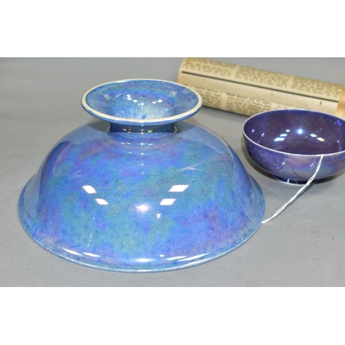 537 - TWO PIECES OF RUSKIN POTTERY, comprising an eggshell bowl decorated in a mottled purple lustre glaze... 