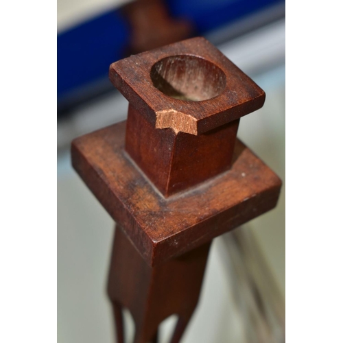 540 - A PAIR OF 20TH CENTURY MAHOGANY AND STAINED CANDLESTICKS, square holder above four slender twisted o... 