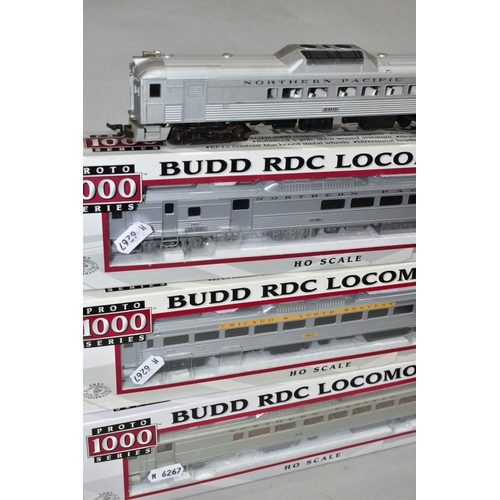 556 - THREE BOXED AND ONE UNBOXED LIFE-LIKE TRAINS H0 GAUGE BUDD RDC LOCOMOTIVES, Chicago and North Wester... 