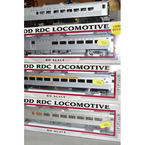 556 - THREE BOXED AND ONE UNBOXED LIFE-LIKE TRAINS H0 GAUGE BUDD RDC LOCOMOTIVES, Chicago and North Wester... 