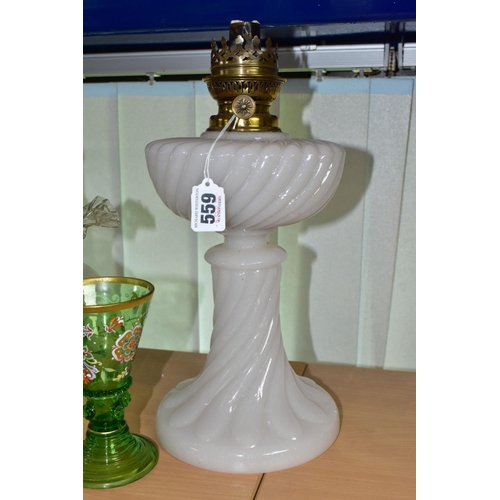 559 - A WHITE OPAQUE OIL LAMP, with clear chimney and etched glass shade, height 36cm to top of fitting, t... 