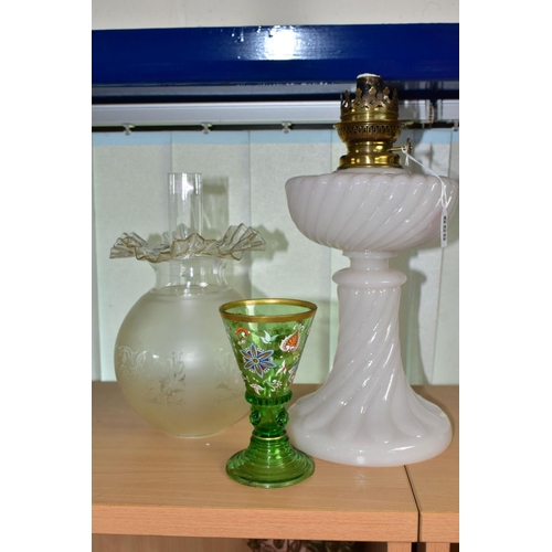 559 - A WHITE OPAQUE OIL LAMP, with clear chimney and etched glass shade, height 36cm to top of fitting, t... 