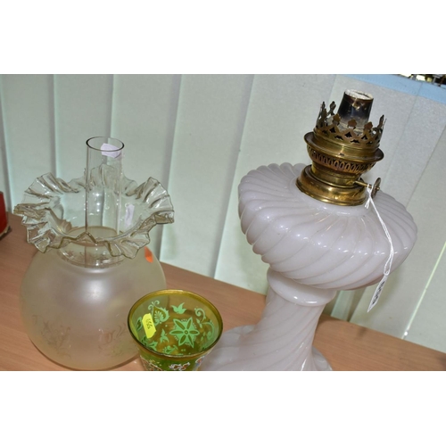 559 - A WHITE OPAQUE OIL LAMP, with clear chimney and etched glass shade, height 36cm to top of fitting, t... 