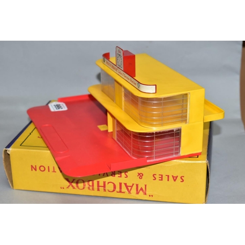 566 - A BOXED MATCHBOX SERIES ESSO SALES & SERVICE STATION, No. MG1, red base and roof sign, yellow ramp a... 