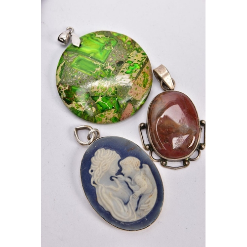 238 - FIVE PENDANTS, to include a white metal agate cabochon, fitted with a tapered bail stamped '925', a ... 