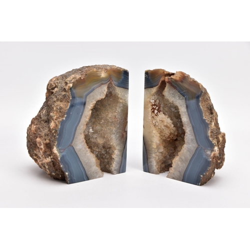 325 - TWO GEODE BOOK ENDS, quartz geodes with a bluish/grey banded rim