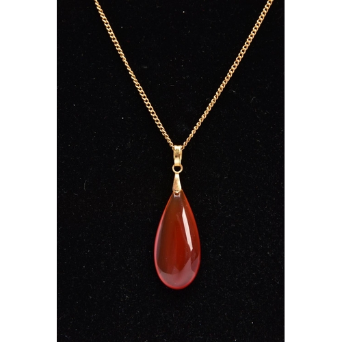 338 - A PENDANT AND CHAIN, the pear shape carnelian pendant suspended from a fine curb link chain, chain w... 