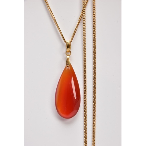 338 - A PENDANT AND CHAIN, the pear shape carnelian pendant suspended from a fine curb link chain, chain w... 