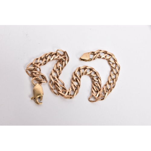 17 - A YELLOW METAL DOUBLE CURB LINK BRACELET, double curb links, fitted with an AF lobster claw clasp, s... 