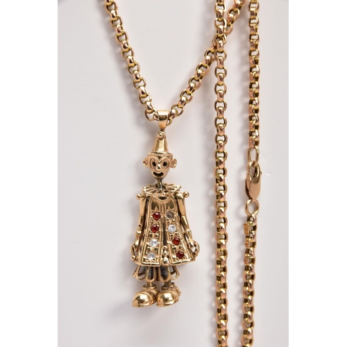 20 - A 9CT GOLD, GEM SET CLOWN PENDANT AND CHAIN, the articulated clown pendant set with red and colourle... 