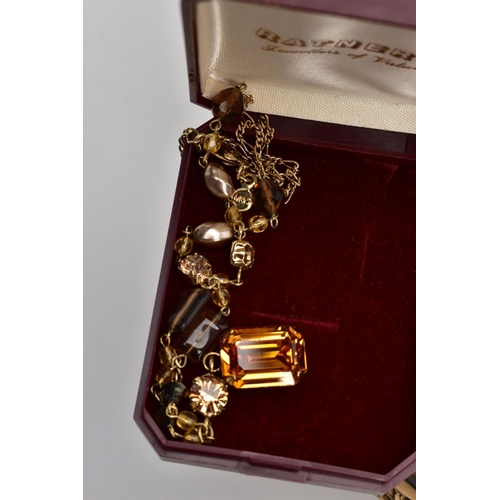 186 - A BOX OF ASSORTED COSTUME JEWELLERY, to include various beaded necklaces and bracelets, brooches, ea... 