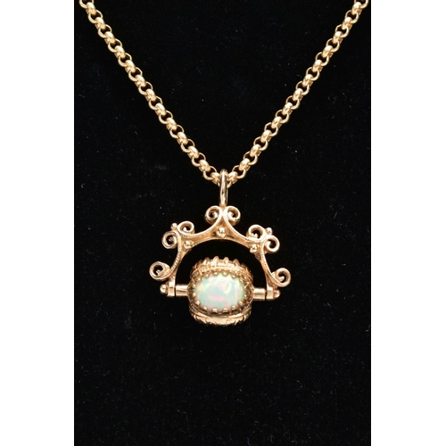 61 - A YELLOW METAL SWIVEL FOB PENDANT AND CHAIN, the swivel fob set with three oval synthetic opal caboc... 