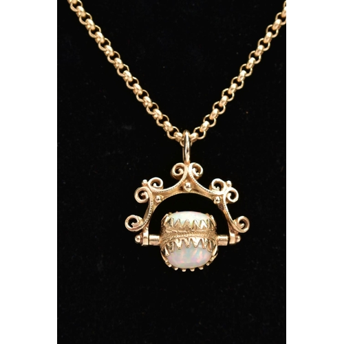 61 - A YELLOW METAL SWIVEL FOB PENDANT AND CHAIN, the swivel fob set with three oval synthetic opal caboc... 