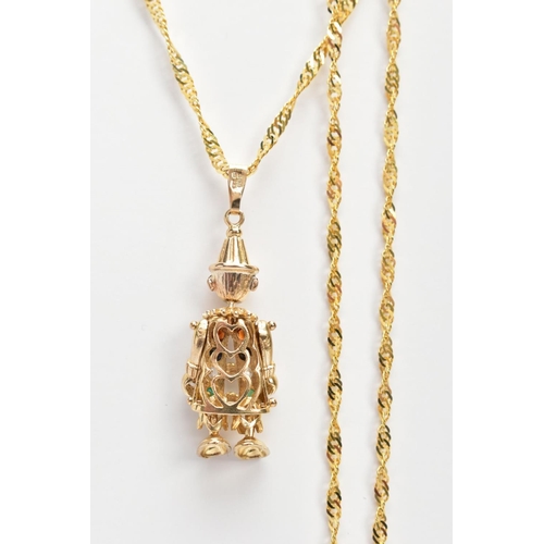 64 - A 9CT GOLD CLOWN PENDANT NECKLACE, the small articulated clown pendant, set with colourful stones to... 