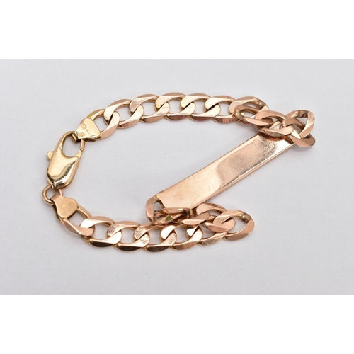 66 - A 9CT GOLD IDENTIFICATION BRACELET, vacant identification panel, on a flat curb link bracelet fitted... 