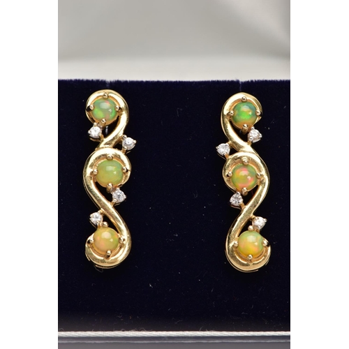 109 - A PAIR OF 9CT GOLD, OPAL DROP EARRINGS, each drop set with three circular opal cabochons, and four c... 