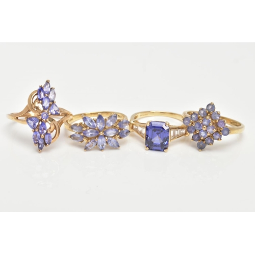 71 - THREE 9CT GOLD TANZANITE RINGS AND ONE SIMULATED TANZANITE 14CT GOLD RING, sixteen stone tanzanite c... 