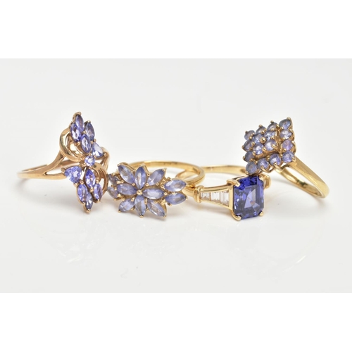 71 - THREE 9CT GOLD TANZANITE RINGS AND ONE SIMULATED TANZANITE 14CT GOLD RING, sixteen stone tanzanite c... 
