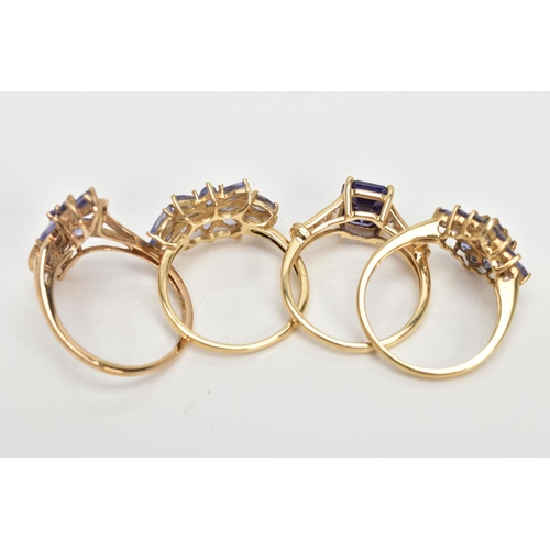 71 - THREE 9CT GOLD TANZANITE RINGS AND ONE SIMULATED TANZANITE 14CT GOLD RING, sixteen stone tanzanite c... 