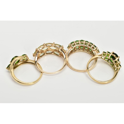 82 - FOUR 9CT GOLD GEMSET RINGS, to include a three stone ring, assessed as circular cut diopside, prong ... 