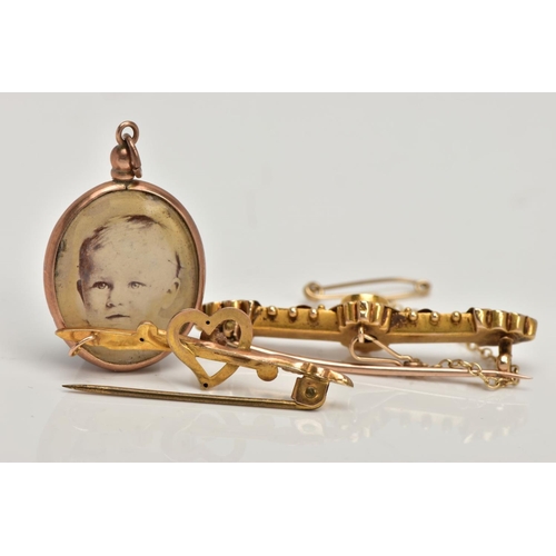 97 - A VICTORIAN BROOCH, HEART BROOCH AND LOCKET, the Victorian brooch designed with a star set, rose cut... 