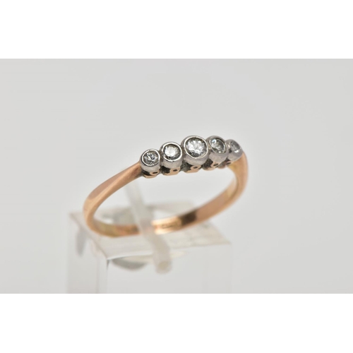 1 - A YELLOW METAL FIVE STONE DIAMOND RING, designed with five graduated round brilliant cut diamonds, e... 