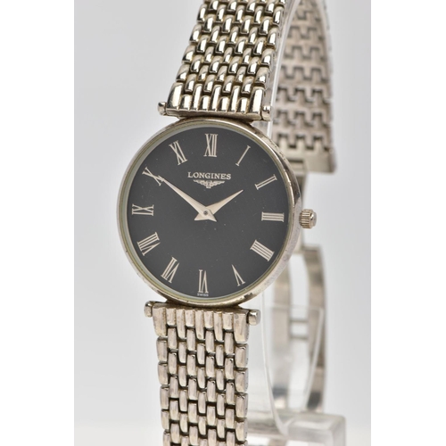 95 - A GENTLEMENS 'LONGINES' WRISTWATCH, round black textured dial signed 'Longines', Roman numerals, sil... 