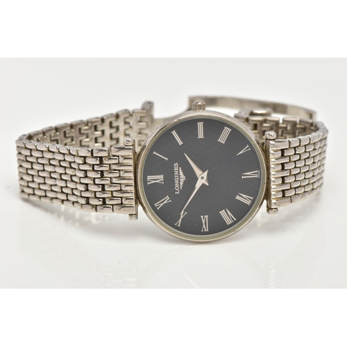 95 - A GENTLEMENS 'LONGINES' WRISTWATCH, round black textured dial signed 'Longines', Roman numerals, sil... 