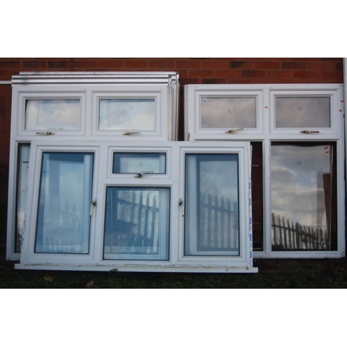 1211 - FOUR UPVC DOUBLE GLAZED WINDOWS AND A DOOR, three at actual frame width 135cm x height 147cm, one at... 
