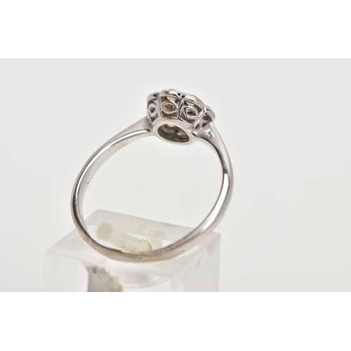 35 - A DIAMOND CLUSTER RING, white metal flower shape cluster set with nine old cut diamonds, estimated t... 