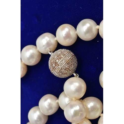 45 - A STRAND OF CULTURED PEARLS, fifty three white pearls with a slightly pink hue measuring approximate... 