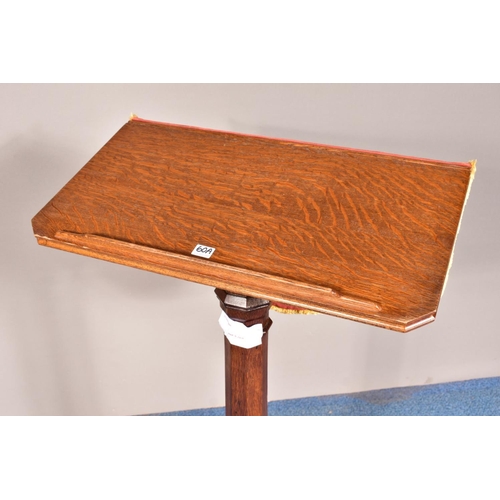 1546 - A 20TH CENTURY OAK ECCLESIASTICAL LECTURN, with fabric pulpit fall, height 124cm