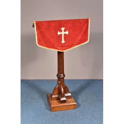1546 - A 20TH CENTURY OAK ECCLESIASTICAL LECTURN, with fabric pulpit fall, height 124cm