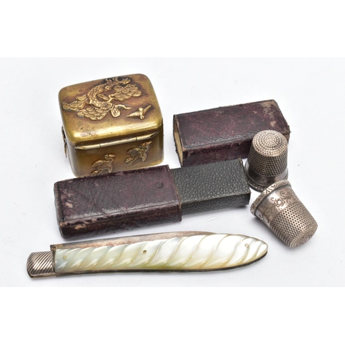 185 - A SILVER FRUIT KNIFE AND OTHER ITEMS, a silver fruit knife with a carved mother of pearl handle, hal... 