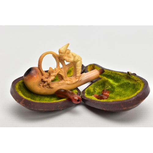 186 - A MEERSCHAUM CARVED PIPE, AF a carved pipe depicting a boy and a dog, together with original fitted ... 