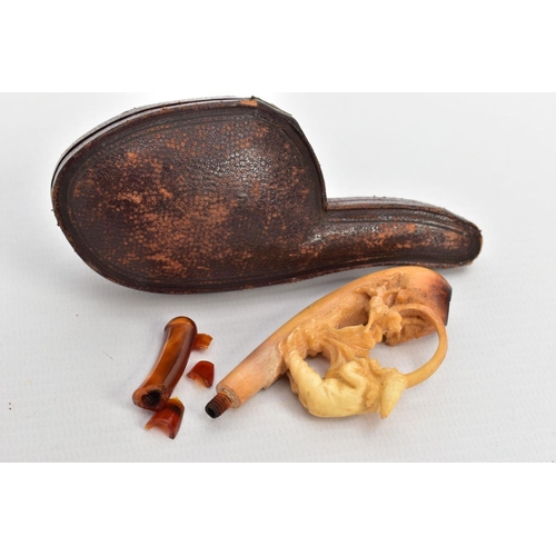 186 - A MEERSCHAUM CARVED PIPE, AF a carved pipe depicting a boy and a dog, together with original fitted ... 