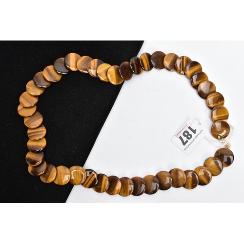 187 - A TIGERS EYE NECKLACE, necklace consisting of forty-three polished tigers eye circular shaped disks,... 