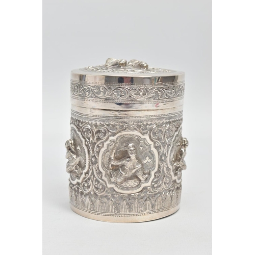 198 - A WHITE METAL POT, embossed with south Asian artwork, the pot with a removable lid depicts two boys ... 