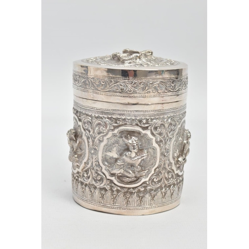 198 - A WHITE METAL POT, embossed with south Asian artwork, the pot with a removable lid depicts two boys ... 