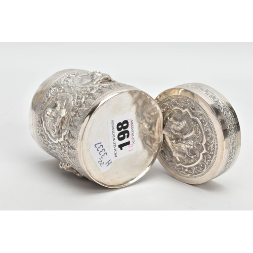 198 - A WHITE METAL POT, embossed with south Asian artwork, the pot with a removable lid depicts two boys ... 