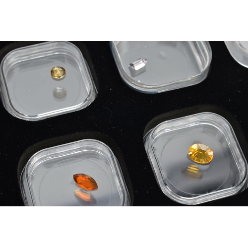 200 - TWO BOXES OF COLLECTORS GEMSTONES, to include cut and polished gemstones in individual storage tubs,... 