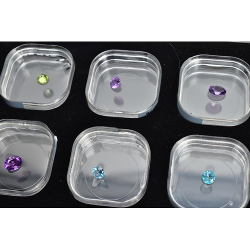 200 - TWO BOXES OF COLLECTORS GEMSTONES, to include cut and polished gemstones in individual storage tubs,... 
