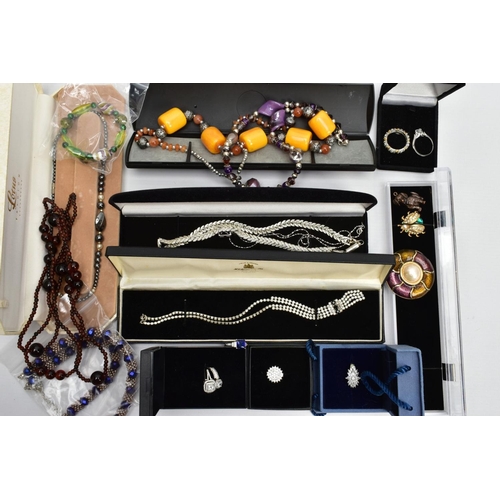 209 - A BOX OF ASSORTED COSTUME JEWELLERY, to include seven white metal rings each set with cubic zirconia... 