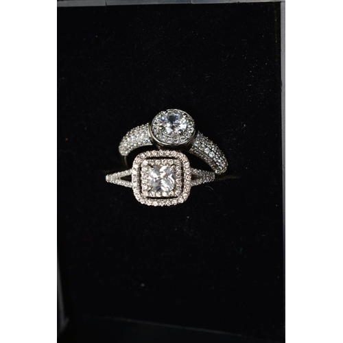 209 - A BOX OF ASSORTED COSTUME JEWELLERY, to include seven white metal rings each set with cubic zirconia... 